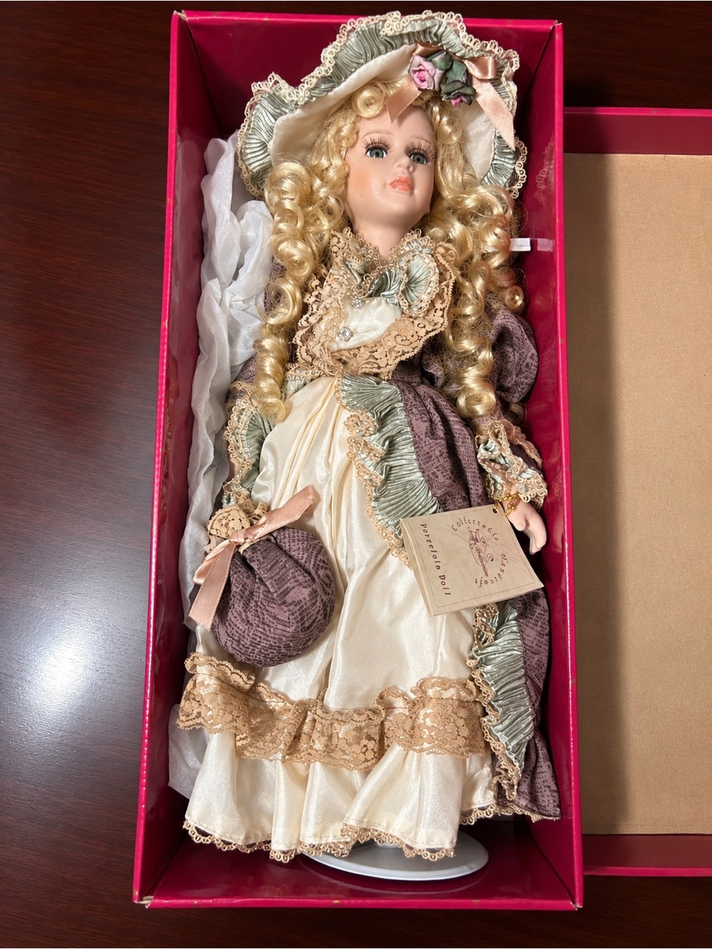 Porcelain Collectible Doll in Cream and Mauve with Lace Trim